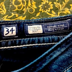 Super cute.  Small blemish on back leg.  34 boot